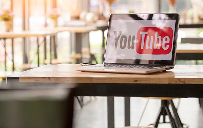 Open laptop with YouTube screen — visual for YouTube Ads agency services