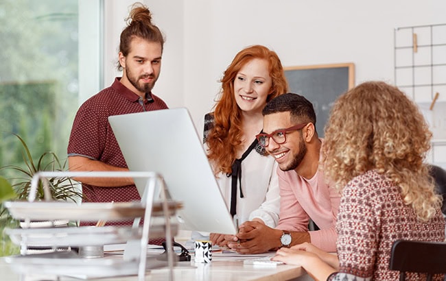 Creative team planning a social media marketing campaign in a digital agency setting