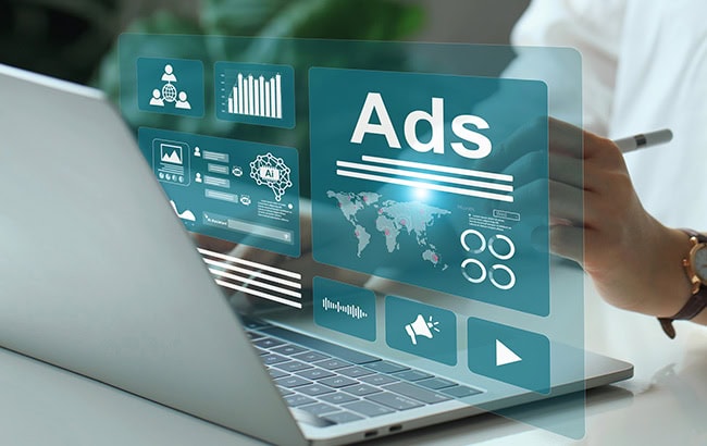 Person managing Google Ads campaign through digital performance dashboard