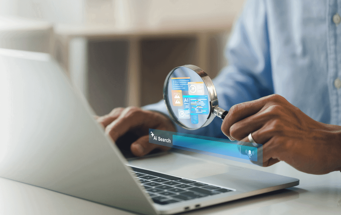 Person using a laptop with digital magnifying glass highlighting AI search results and generative content panels